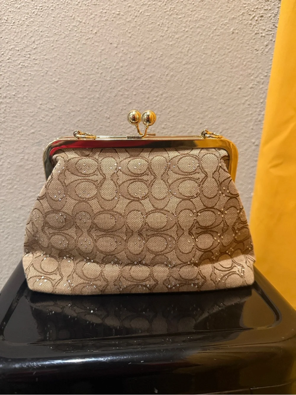Elegant Beige Logo-Pattern Clasp Handbag